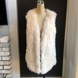 Decree ivory fussy vest.